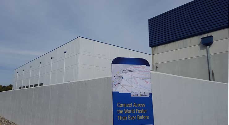 The new NJFX data center (at left) next to the Tata Communications undersea cable landing station in Wall Township, N.J. (Photo: Rich Miller)